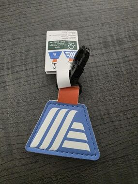 Aldi Blue & White Geometric Quarter Holder with Classic Logo